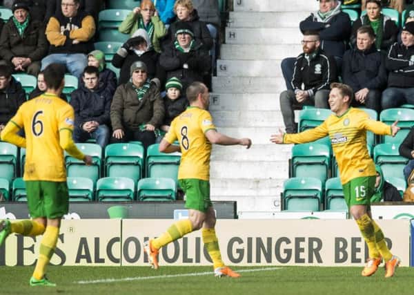 Kris Commons celebrates his opening goal. Picture: Ian Georgeson
