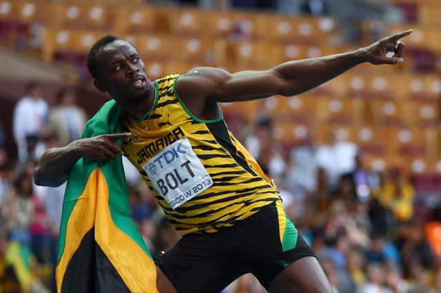 Bolt celebrates winning gold in the 200 metres at the World Championships in Moscow. Picture: Getty