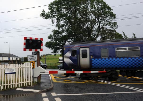 Four open level crossings will have barriers installed this year. Picture: Ian Rutherford