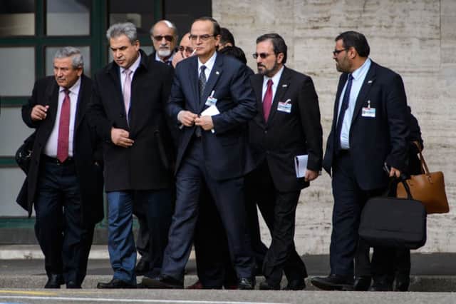 The Syrian opposition negotiating team in Geneva yesterday. Picture: Getty