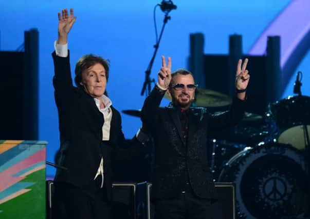 Sir Paul McCartney and Ringo Starr after their Grammys performance. Picture: Getty