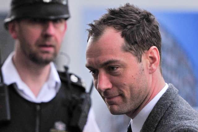 Jude Law arrives at the Old Bailey yesterday to give evidence in the hacking trial. Picture: Getty
