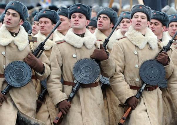 Russian soldiers mark the 70th anniversary of the ending of the Nazi blockade of Leningrad Picture: Getty