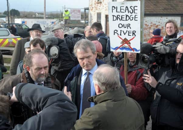 Environment secretary Owen Paterson, centre, visiting Northmoor Pumping Station in Somerset last month. Picture: PA