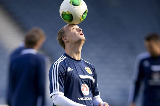 Striker Leigh Griffiths trains with Scotland last September. The Wolves striker is being sought by Celtic. Picture: SNS