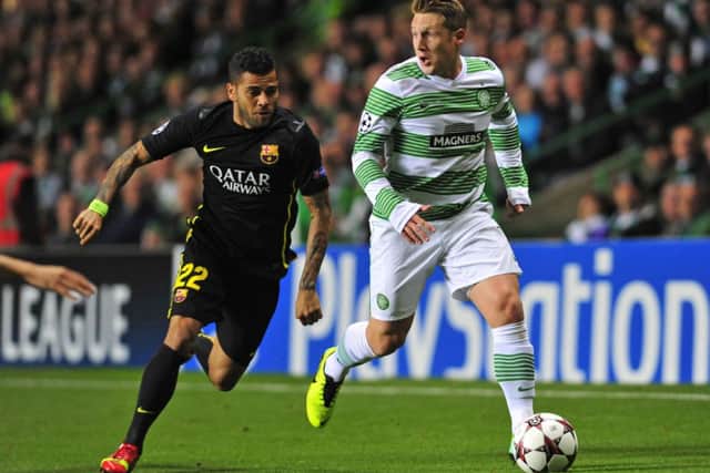 Kris Commons in action against Barcelona. Picture: Robert Perry
