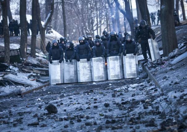 Ukrainian policemen block Grushevskogo Street in Kiev. Picture: Getty