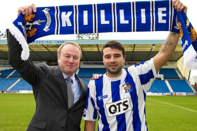 Kilmarnock chairman Michael Johnston with new signing Alexei Eremenko. Picture: SNS