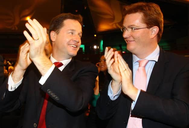 Nick Clegg, left, and Danny Alexander have helped to keep Tories in check. Picture: Getty