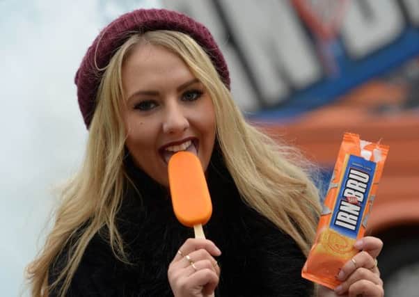 Nadia Stefanowicz, 22, was the first customer to try Irn-Bru's new ice cream. Picture: Hemedia