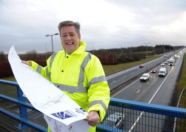 Transport minister Keith Brown on the M8 at EuroCentral. Picture: Hemedia