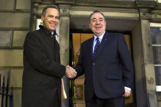 Bank of England Governor Mark Carney, left, and Alex Salmond in Edinburgh yesterday. Picture: PA