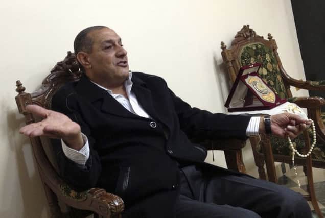 Ahmed Saif in his office in Shebin El Kom, where he has been biding his time since Mubaraks fall. Picture: Reuters