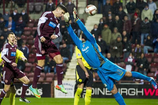 Callum Paterson heads home the equaliser to make it 1-1. Picture: SNS