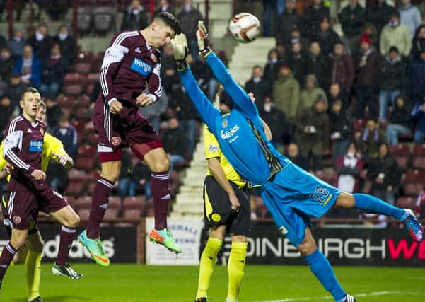 Callum Paterson heads home the equaliser to make it 1-1. Picture: SNS
