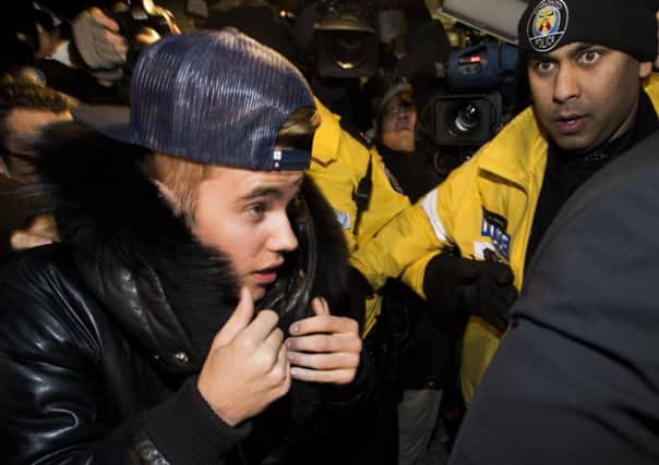 Canadian musician Justin Bieber turns himself in to police in Toronto. Picture: AP