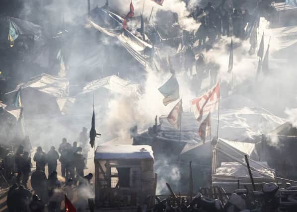 Daytime temperatures were as low as 19C in Independence Square, Kiev. Picture: Reuters