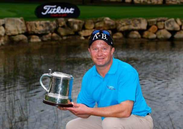 Greig Hutcheon shows off the trophy awarded for winning the Titleist PGA Playoffs on the PGA Sultan Course at Antalya Golf Club in Turkey in November last year. Photograph: Paul Thomas/Getty Images