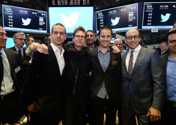 From left, Twitter co-founders Jack Dorsey, Biz Stone, Evan Williams and chief executive Dick Costolo at the New York Stock Exchange. Photograph: Getty Images