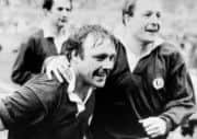 Scottish captain Jim Aitken, left, and hooker Colin Deans in victory celebrate winning the Grand Slam in 1984. Picture: PA
