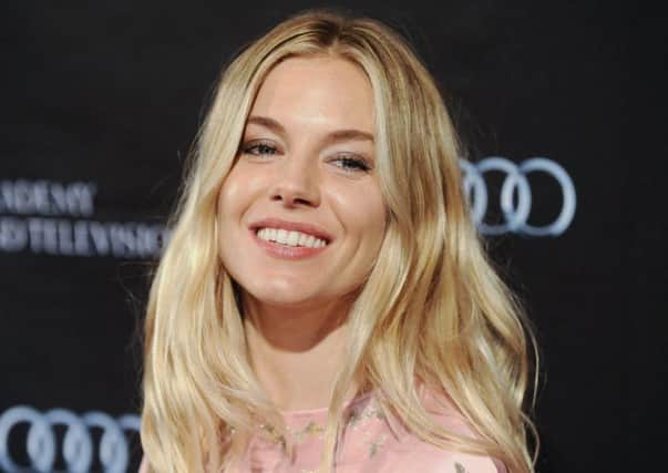 Sienna Miller, centre, appeared by videolink yesterday. Picture: Reuters