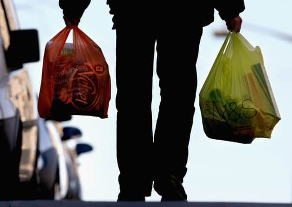 Carrier bags will cost Scottish consumers a minimum of 5p from this autumn. Picture: Getty