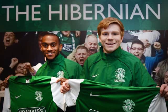 All smiles: Danny Haynes and Duncan Watmore are paraded by Hibernian. Picture: Neil Hanna