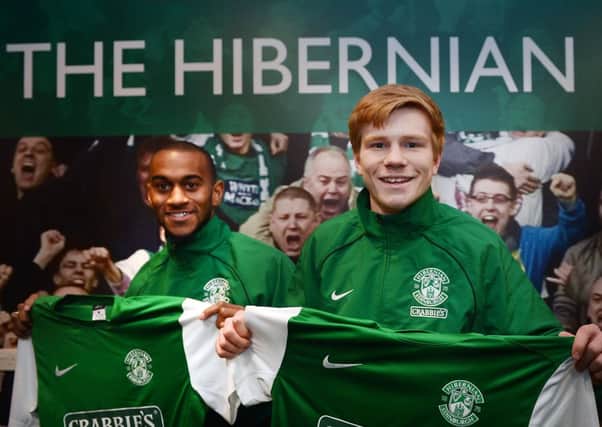 All smiles: Danny Haynes and Duncan Watmore are paraded by Hibernian. Picture: Neil Hanna
