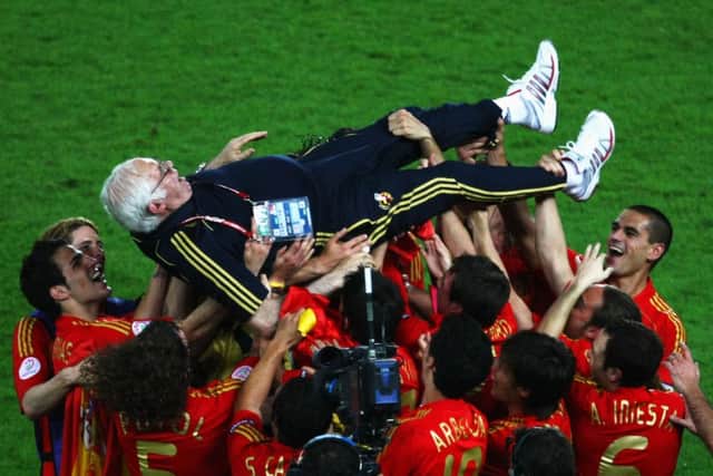 Aragones is lifted by players following Spain's victory over Germany in the UEFA Euro 2008 Final. Picture: Getty