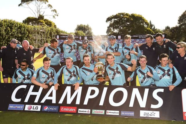 The Scotland team celebrate after their win over UAE in the final of the World Cup qualifying tournament. Photograph: Martin Hunter/Getty