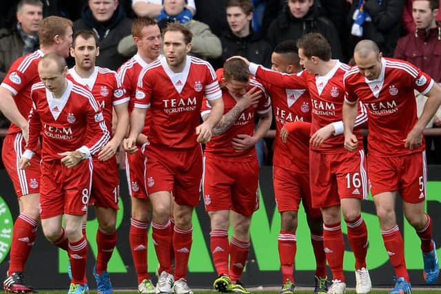 Jubilation for Aberdeen as they sweep St Johnstone aside to advance to the league Cup final. Picture: SNS