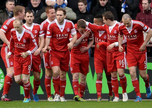 Jubilation for Aberdeen as they sweep St Johnstone aside to advance to the league Cup final. Picture: SNS