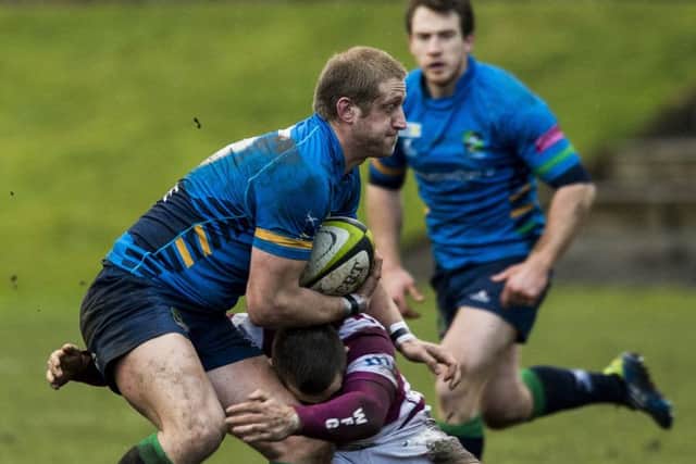 Watsonians Ross Aitken tries to halt Boroughmuirs Alex Cox. Picture: Ian Georgeson