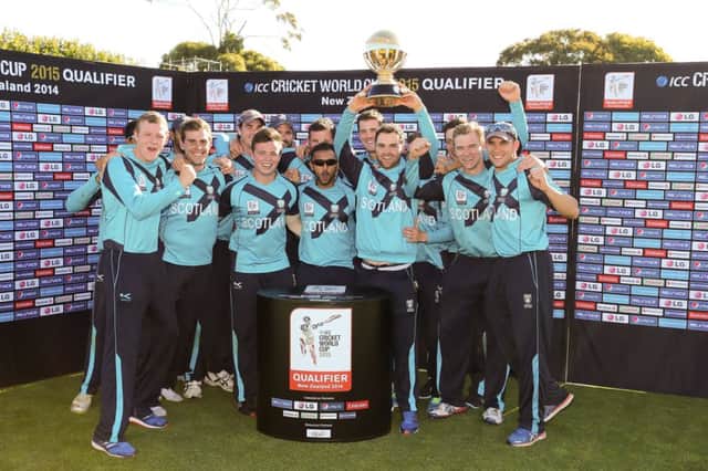 Preston Mommsen raises the World Cup Qualifying Trophy aloft in New Zealand. Picture: Getty