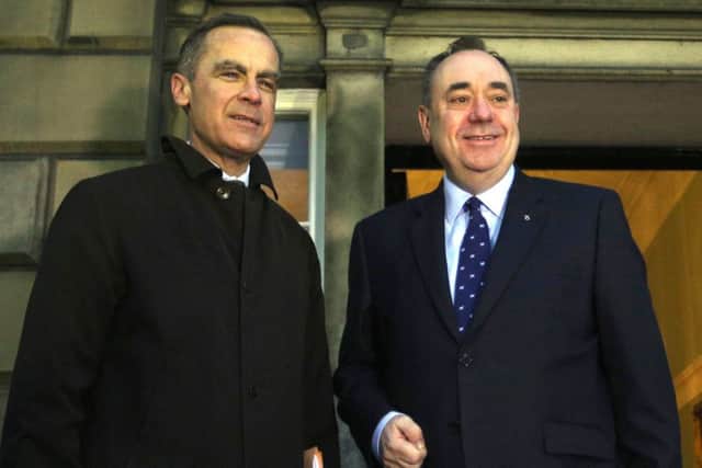 Alex Salmond welcomed Mark Carney to Scotland with maple syrup on his porridge. Picture: PA
