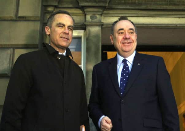 Alex Salmond welcomed Mark Carney to Scotland with maple syrup on his porridge. Picture: PA