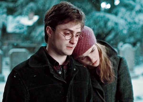 What might have been: Harry (Daniel Radcliffe) and Hermione (Emma Watson). Picture: PA