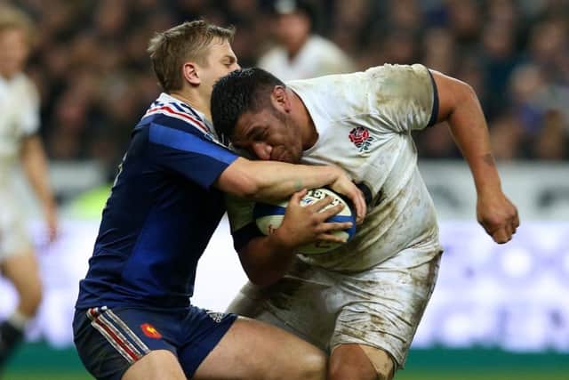 Jules Plisson of France tackles Mako Vunipola. Picture: Getty Images