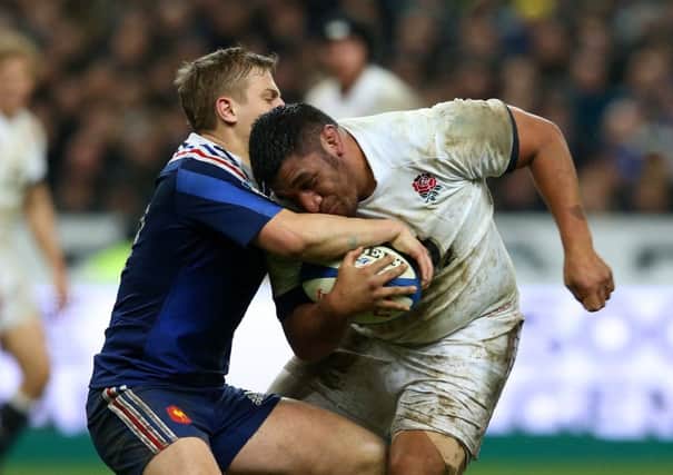 Jules Plisson of France tackles Mako Vunipola. Picture: Getty Images