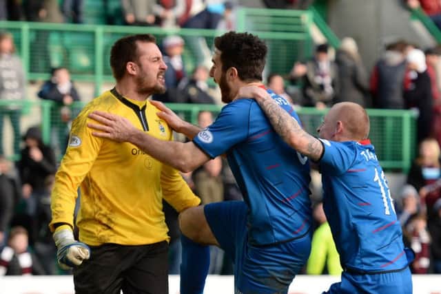 Inverness goalkeeper Dean Brill is hailed by his team-mates for saving two penalties. Picture: SNS