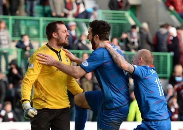 Inverness goalkeeper Dean Brill is hailed by his team-mates for saving two penalties. Picture: SNS