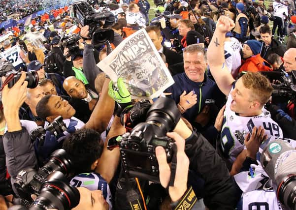 Long snapper Clint Gresham #49 of the Seattle Seahawks celebrates with teammates on the field after winning Super Bowl XLVIII. Picture: Getty