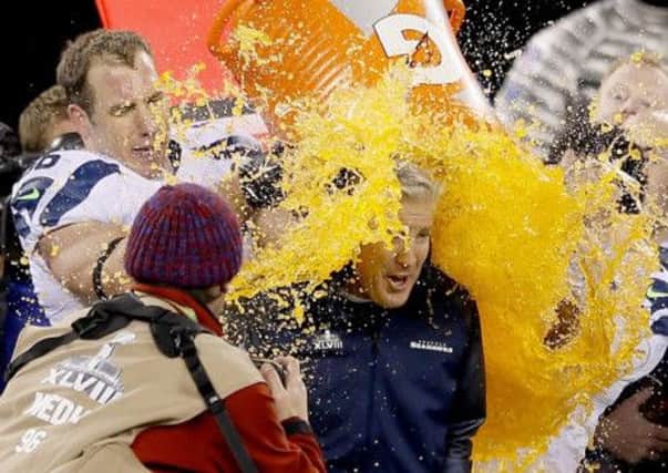 Victorious Seattle Seahawks coach Pete Carroll is showered in the energy drink Gatorade. Picture: Getty