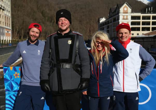 Billy Morgan, Aimee Fuller and Jamie Nicholls of the GB Team share a joke with a policeman. Picture: Getty