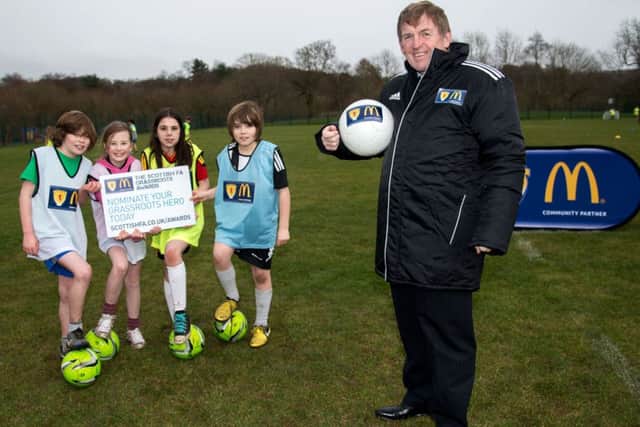 Pupils from Netherlee Primary joined Kenny Dalglish for the launch of the SFAs Grassroots Awards. Picture: SNS