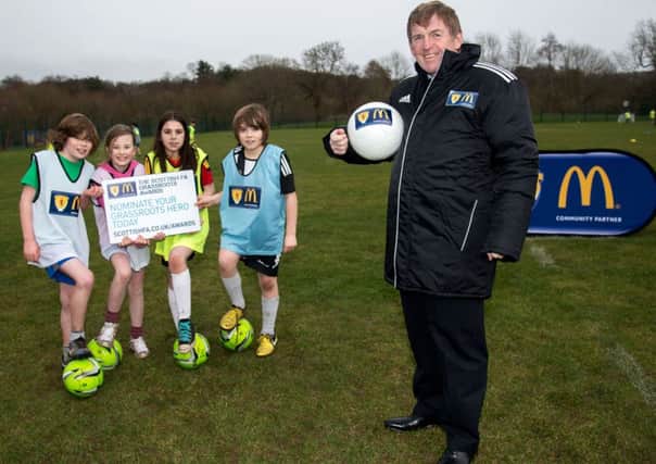 Pupils from Netherlee Primary joined Kenny Dalglish for the launch of the SFAs Grassroots Awards. Picture: SNS