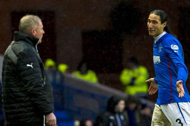 Bilel Mohsni apologises to Ally McCoist after being sent off. Picture: SNS