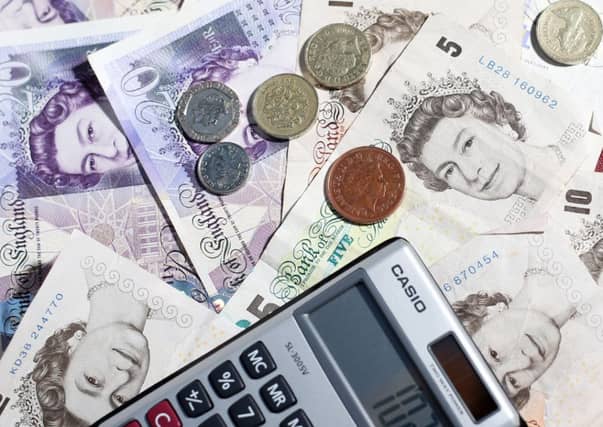 Carers in Scotland are saddled with 'devastating' levels of debt, a charity has said. Picture: PA