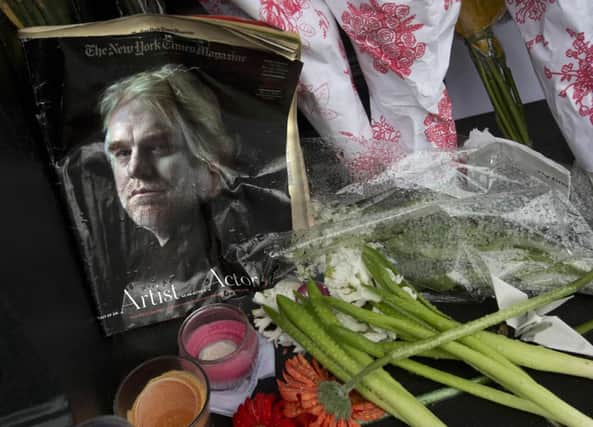 Tributes to actor Philip Seymour Hoffman were left outside his Greenwich Village flat. Picture: Reuters