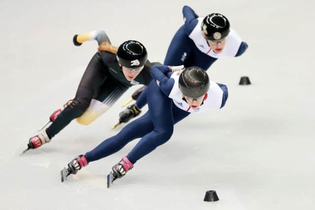 Elise Christie leads the way in a training session while. Picture: PA